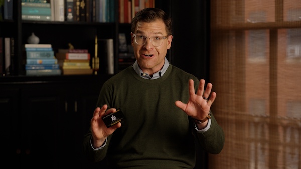 Bryan Holding Black Card