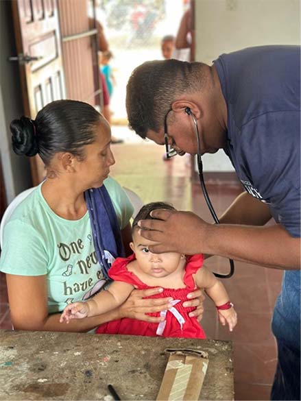 clinic member treating a young girl