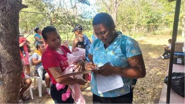 taking info from mother with baby