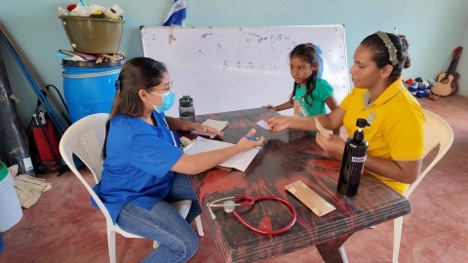 Mother and child receiving care
