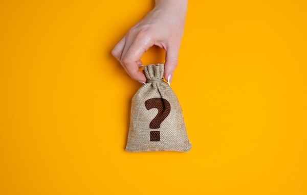 Holding a bag of money