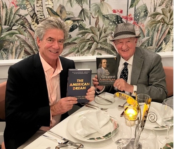 Alex Green and Mark Skousen comparing book titles