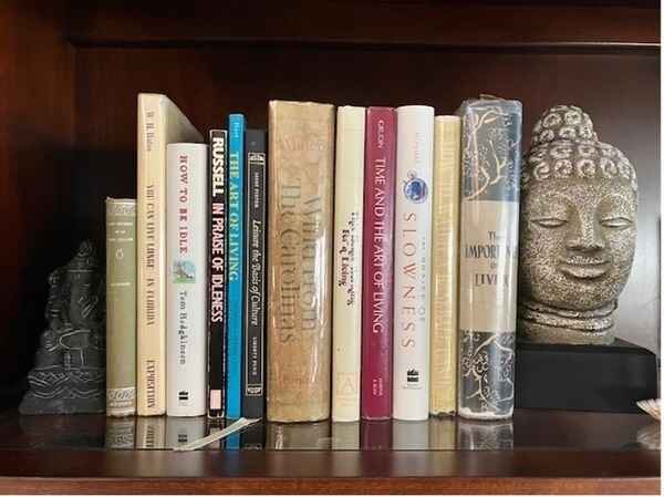 A group of books on a bookshelf